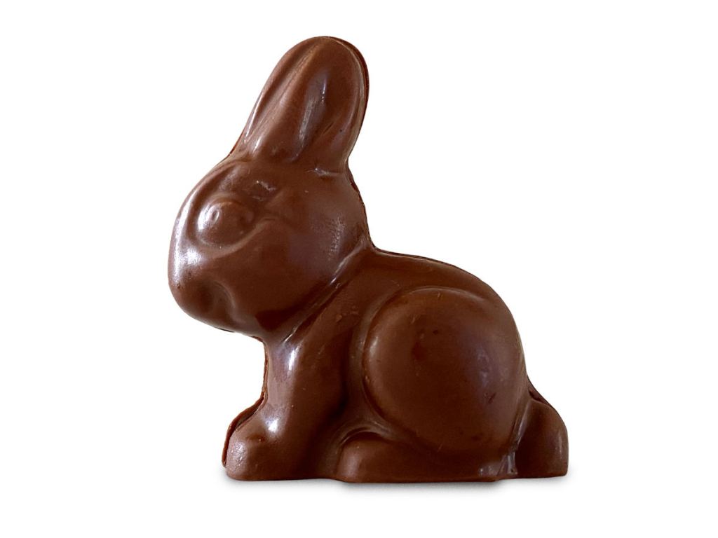 Sjaak's vegan milk chocolate bunny sitting up with ears up, a delicious vegan easter chocolate for all ages