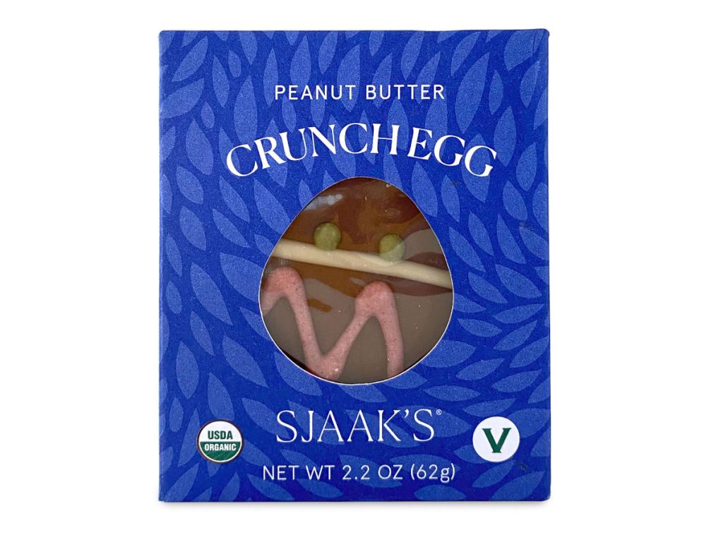 Blue packaging for Sjaak's vegan peanut butter egg with milk chocolate